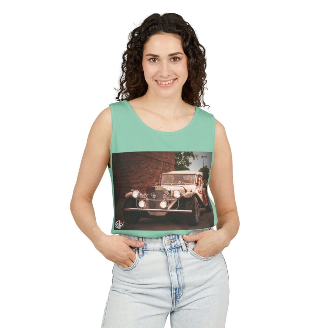 Woman holding a vinyl record of a band performing live on stage.