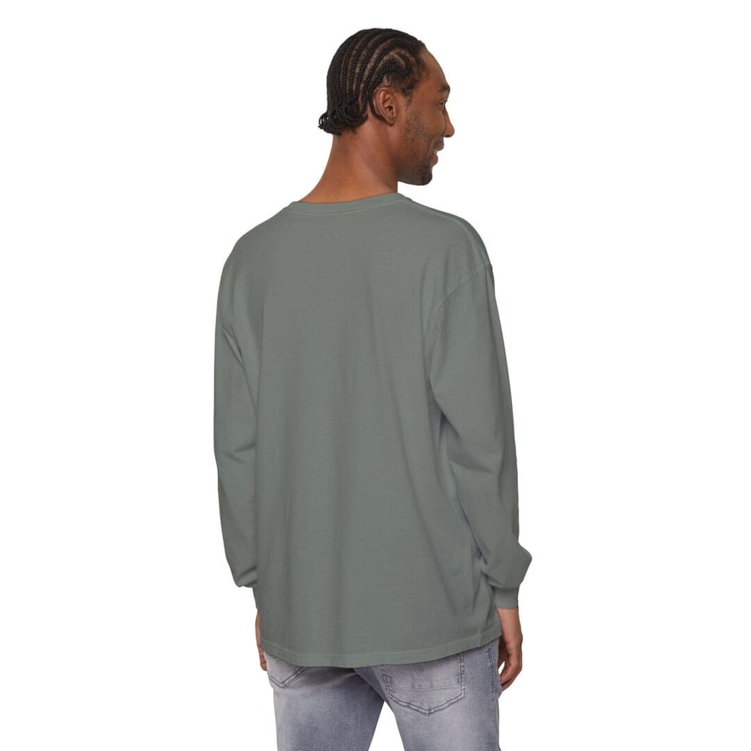 Man wearing a long-sleeve gray shirt viewed from the back.