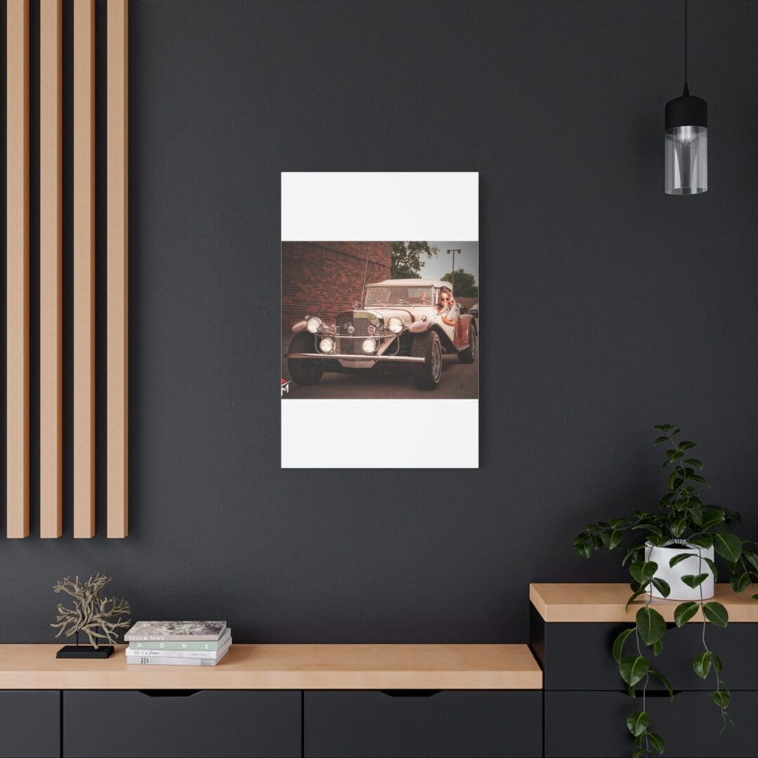 Modern interior with a vintage car poster on a dark wall.