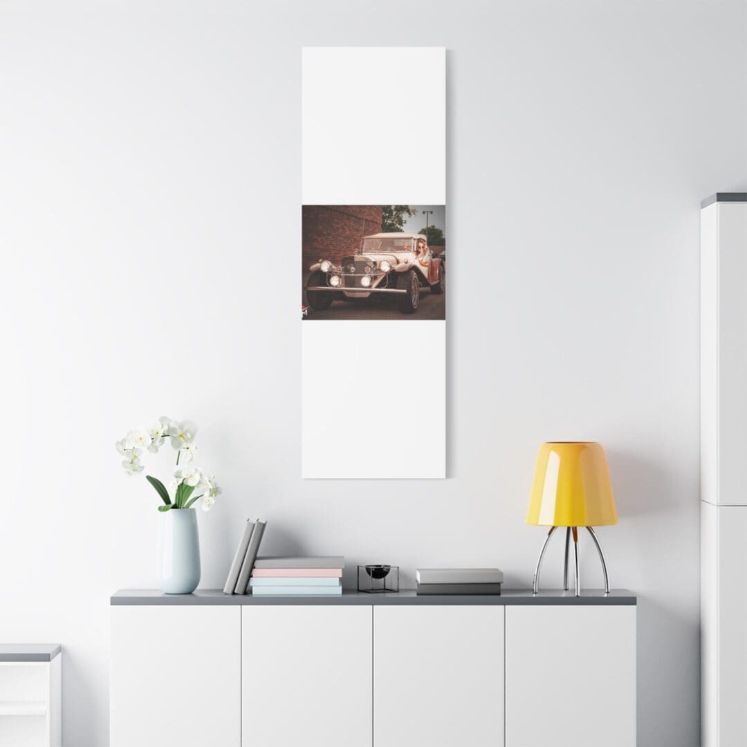 Minimalist interior with wall art, white cabinet, and modern decor.