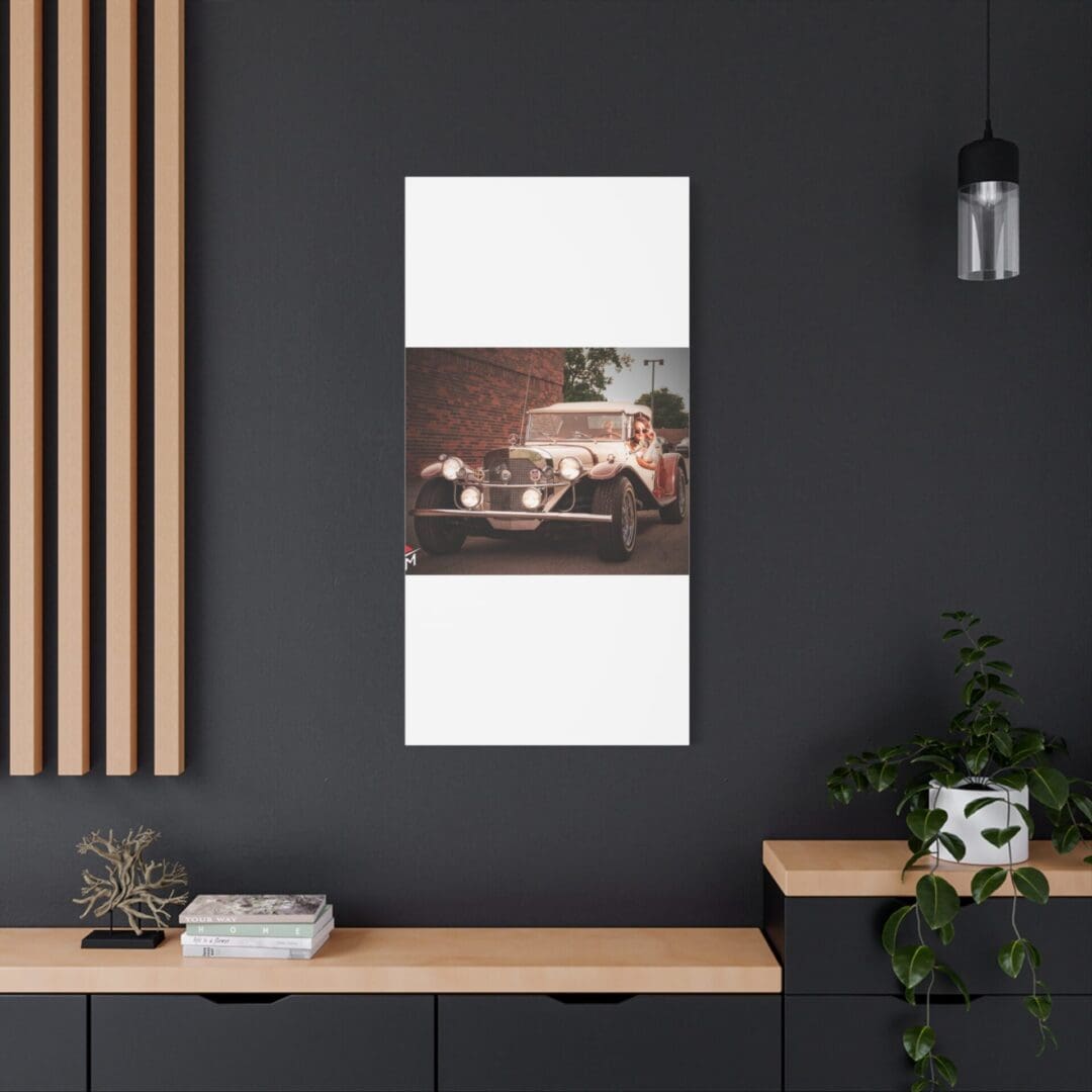 Modern interior with a vintage car photo on a dark wall.