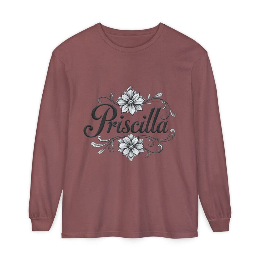 Mauve long-sleeve shirt with floral and text design.