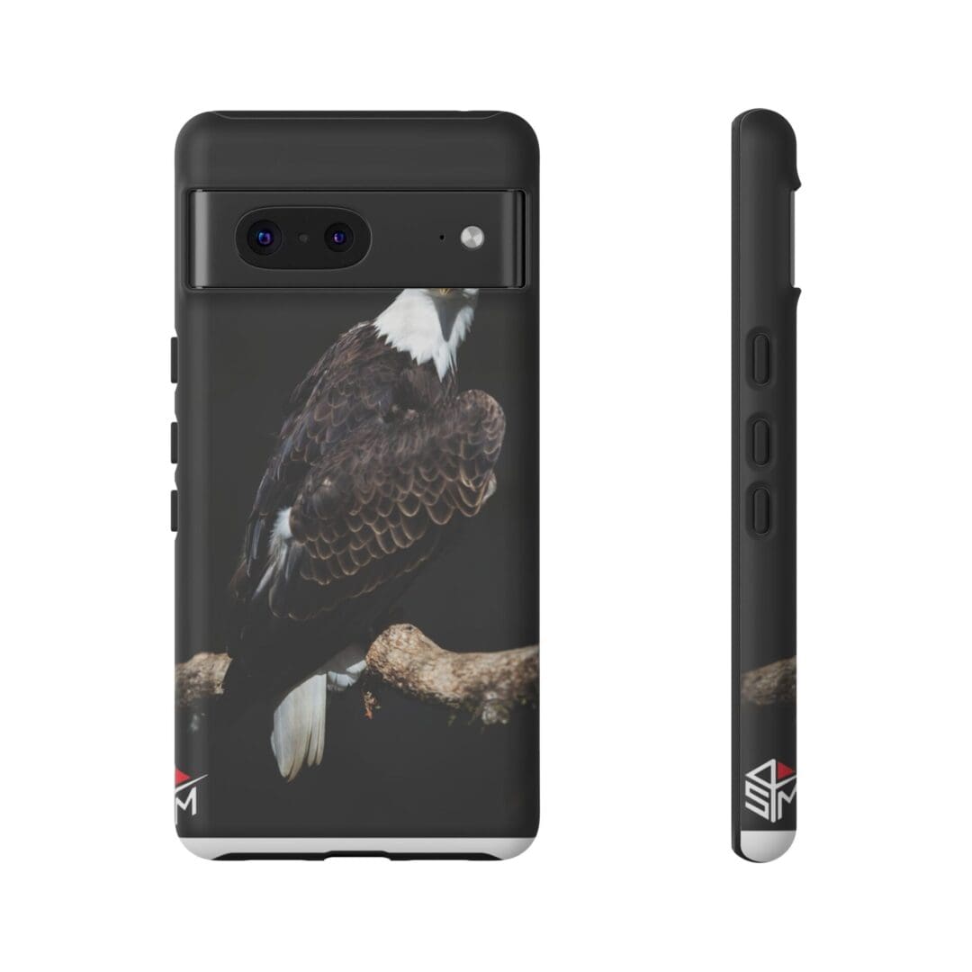 Phone case featuring a detailed bald eagle perched on a branch.