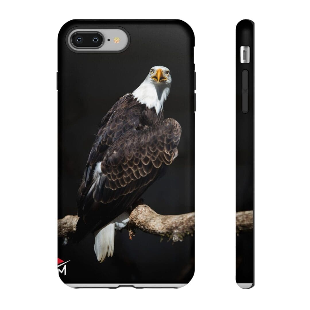 Phone case featuring a detailed bald eagle perched on a branch.