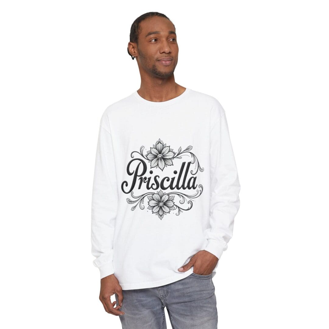 Man wearing a white long-sleeve shirt with 'Priscilla' printed on it.