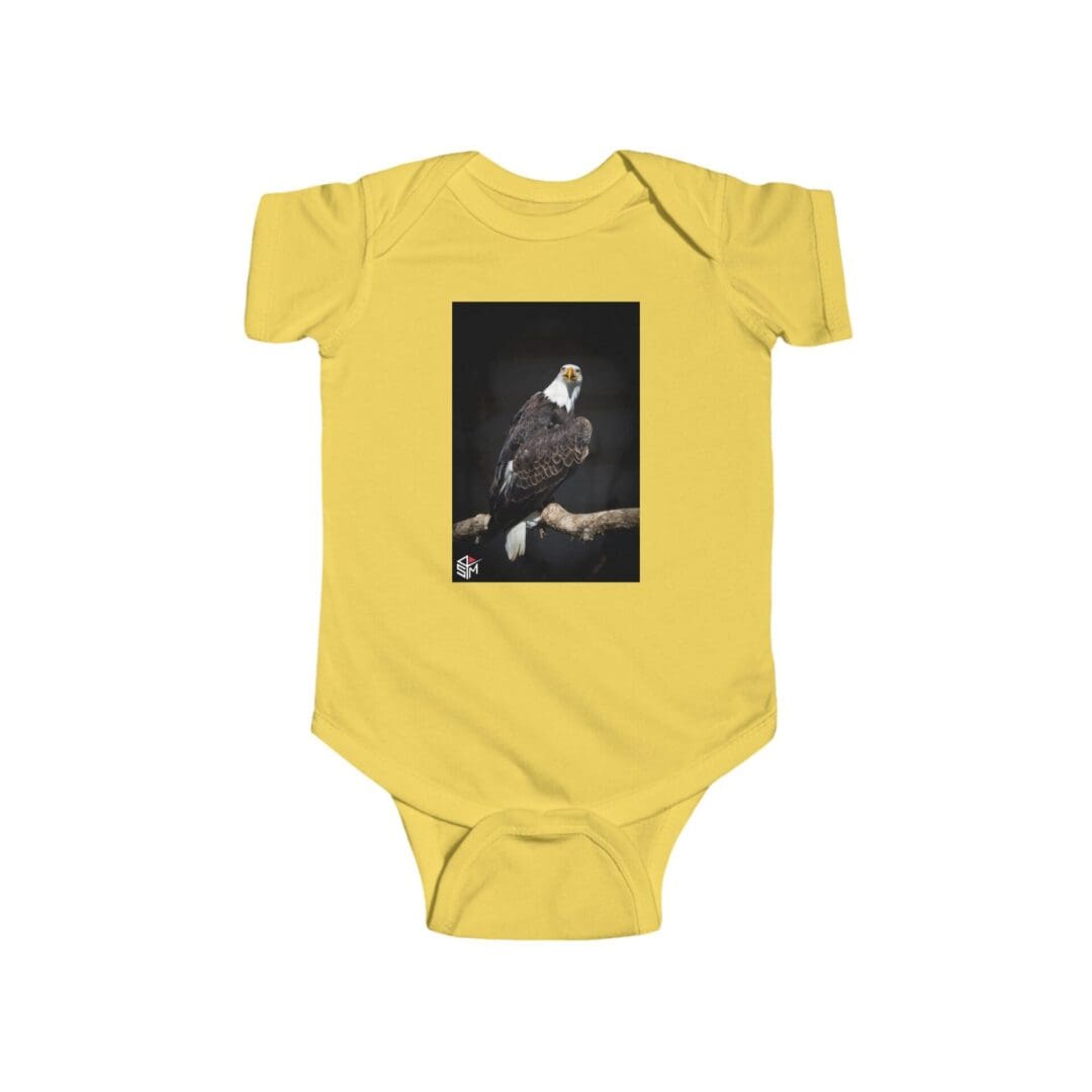 Yellow baby onesie featuring a black-and-white photo of a musician playing guitar.