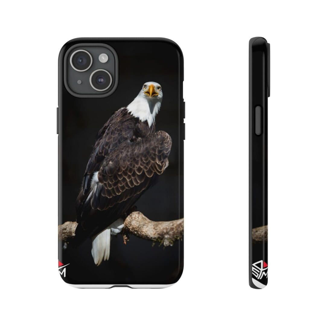 Phone case featuring a bald eagle perched on a branch against a black background.