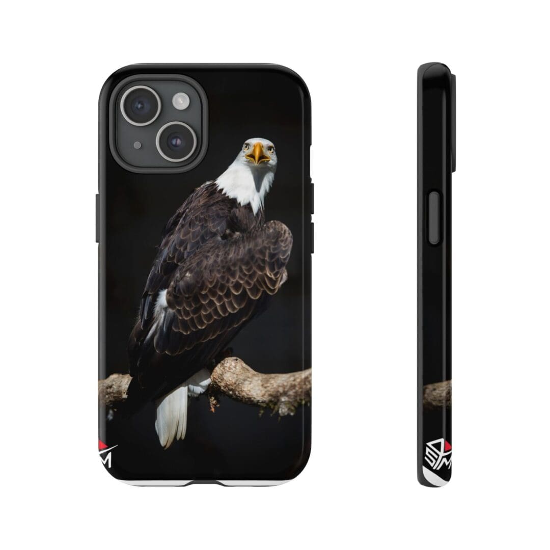 Phone case featuring a bald eagle perched on a branch with a black background.