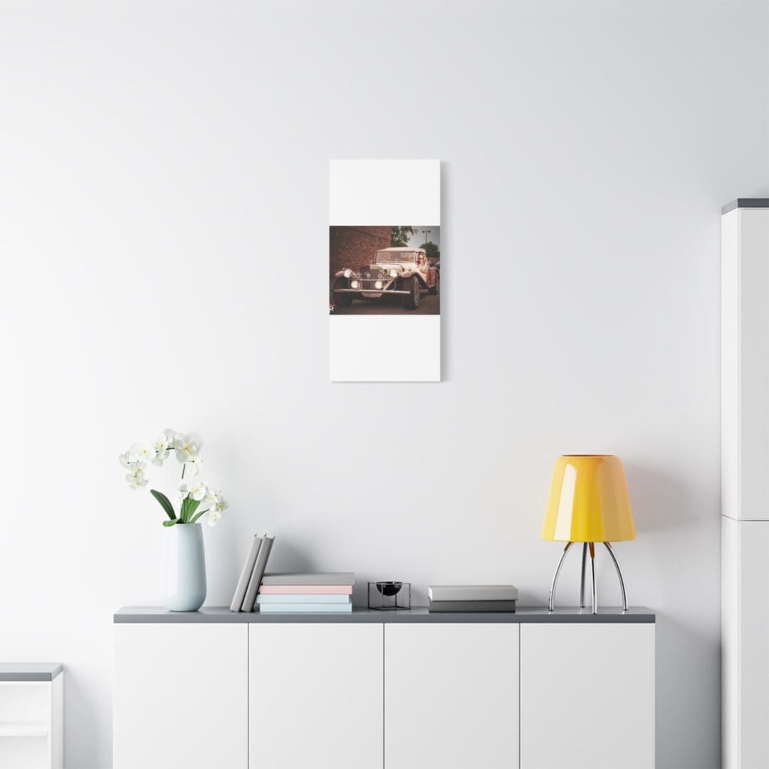Minimalist white sideboard with a yellow lamp and a small plant.