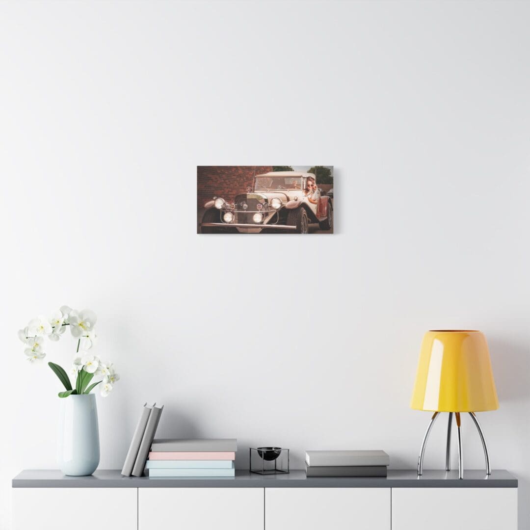 Modern living room with a sleek white shelf, yellow lamp, and wall art.