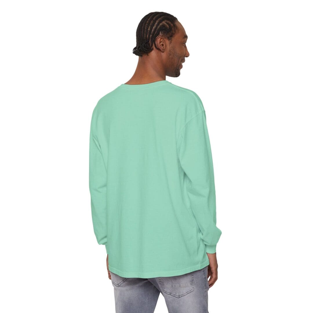 Man wearing a mint green long-sleeve shirt, back view.