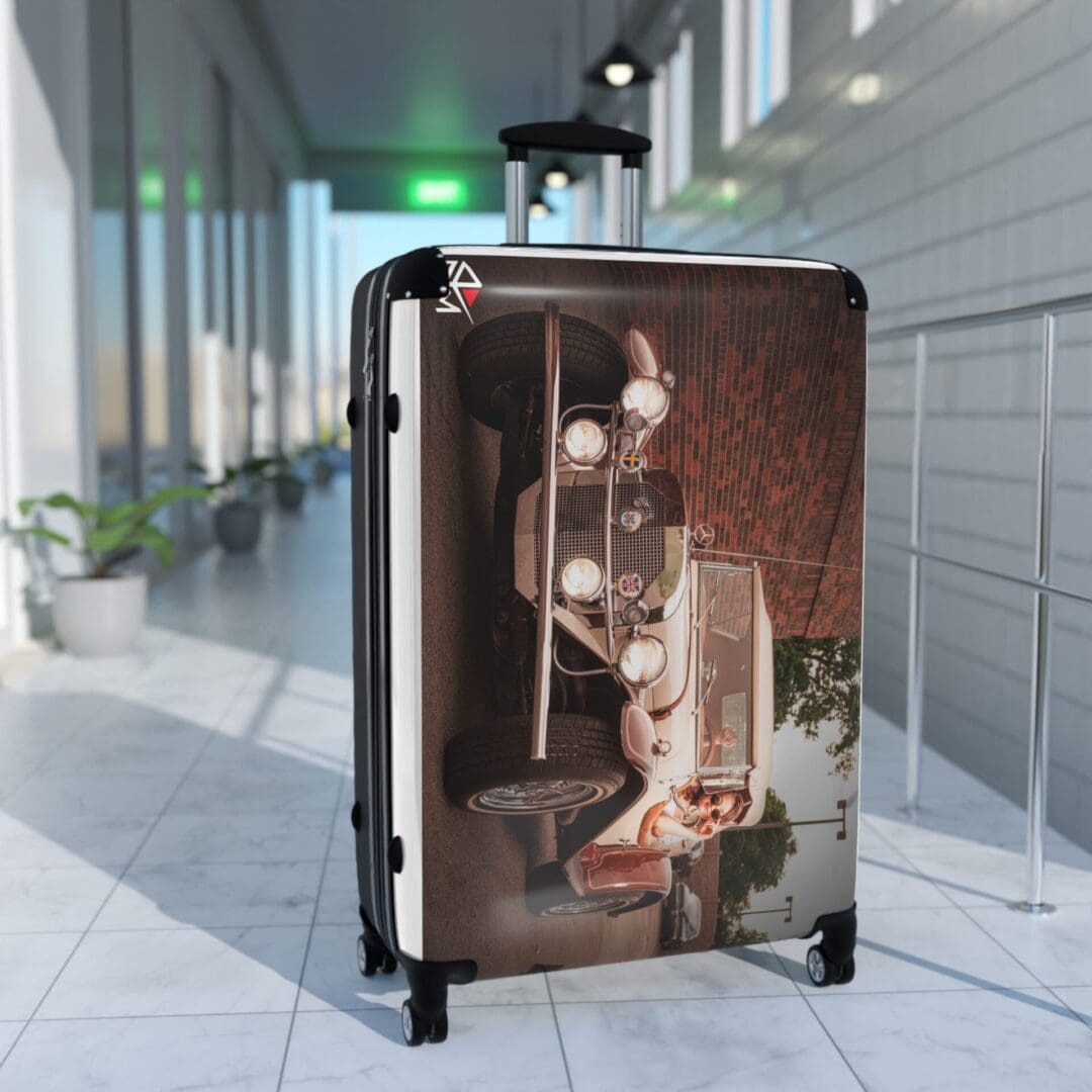 Suitcase with a vintage camera design standing in a hallway.