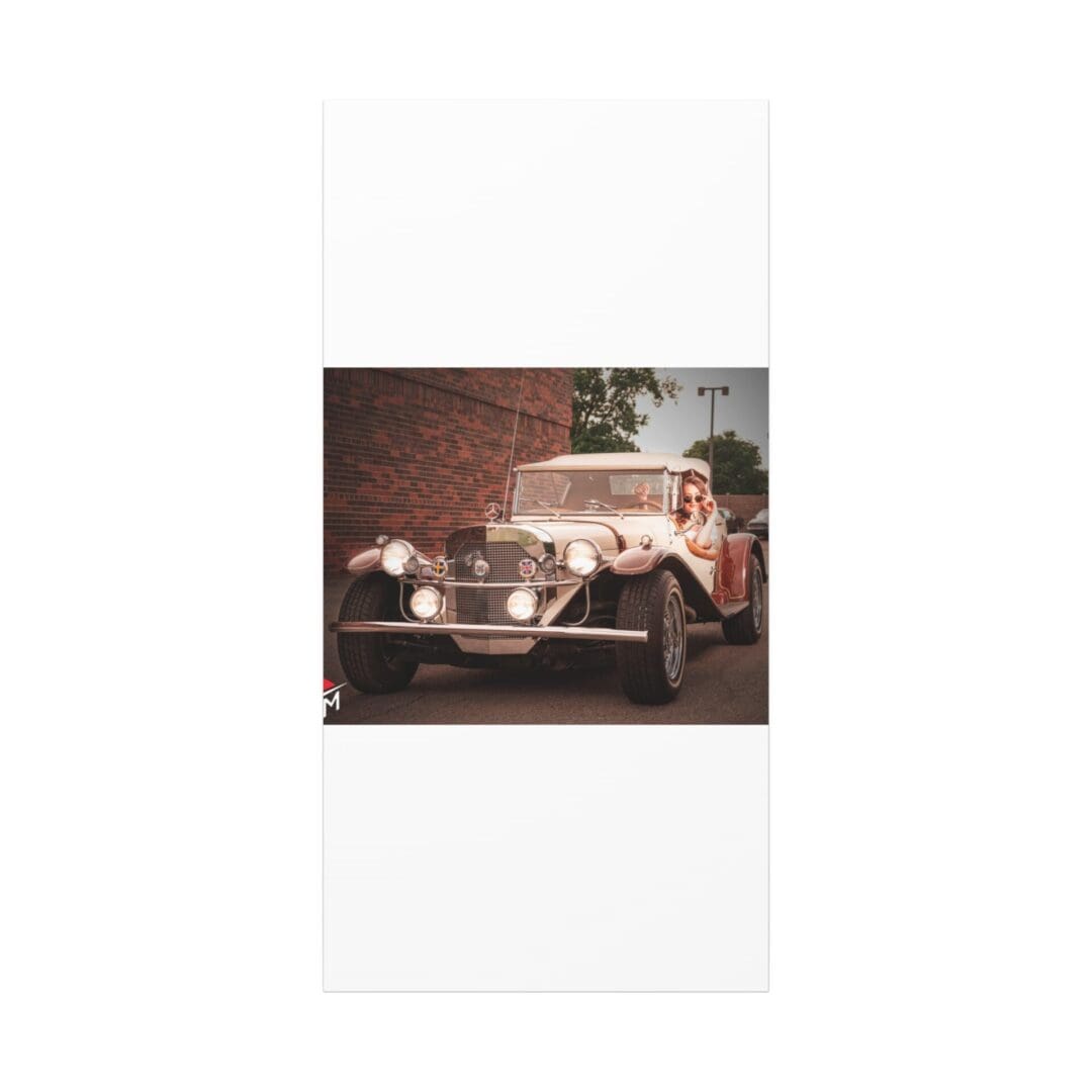 Vintage car displayed indoors with a person nearby.