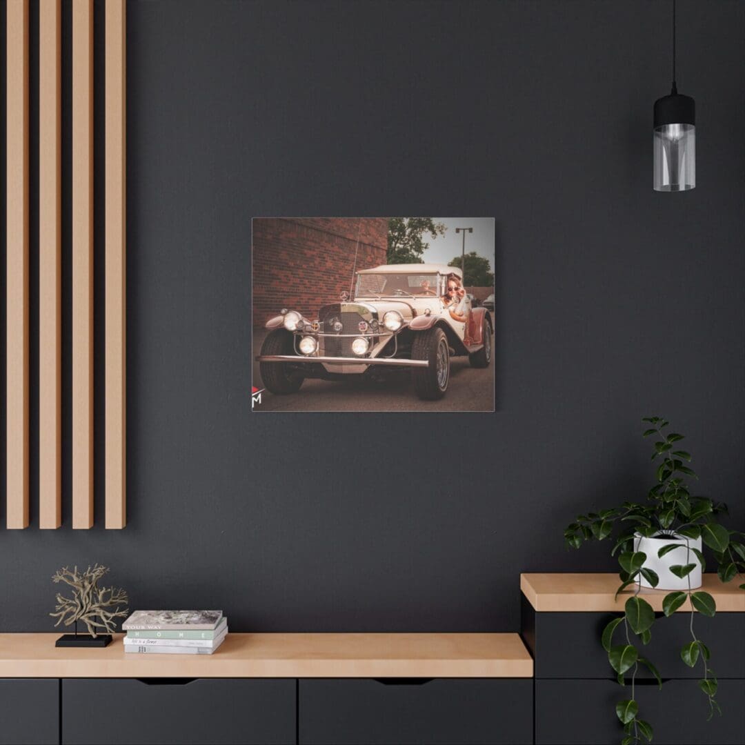Modern workspace with dark walls, wooden accents, and vintage car art.