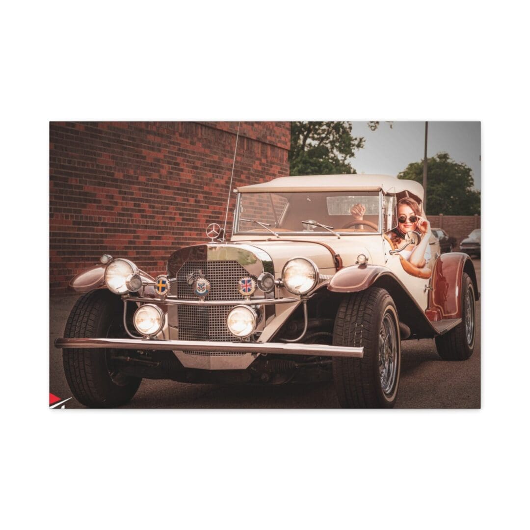 Vintage white car with a bride and groom inside on a sunny day.