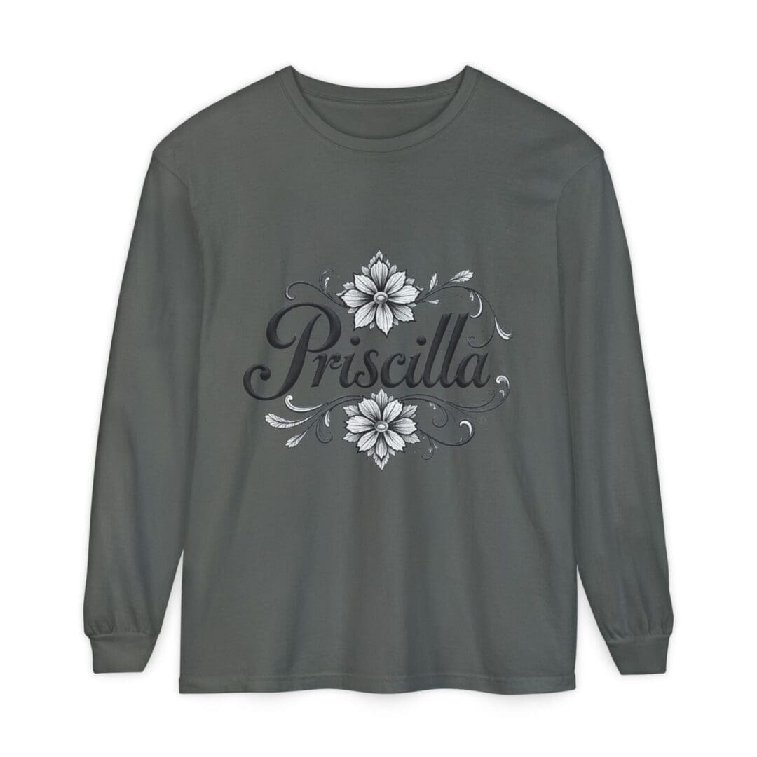 Dark long-sleeve shirt with floral design and text.