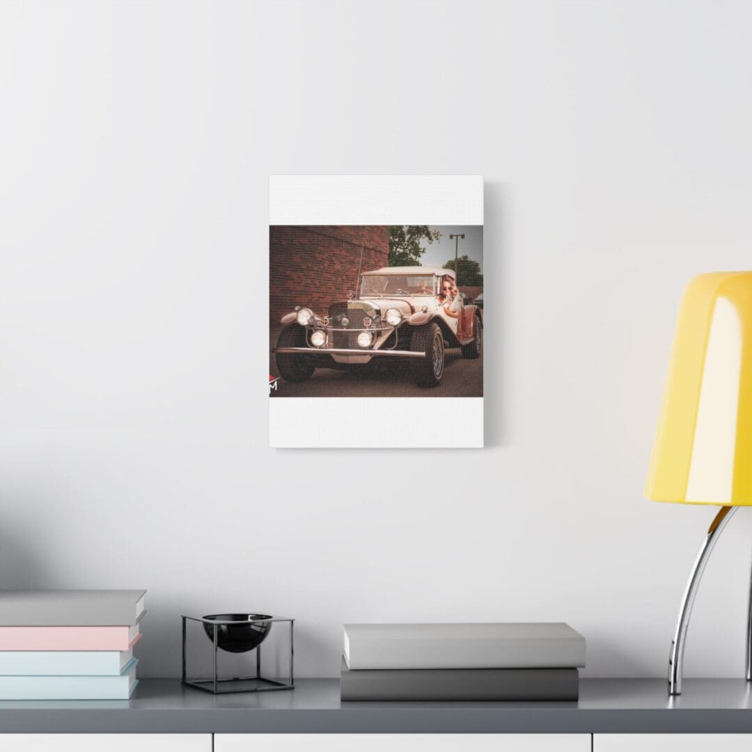 Modern living room with minimalist decor and a cozy photo on the wall.