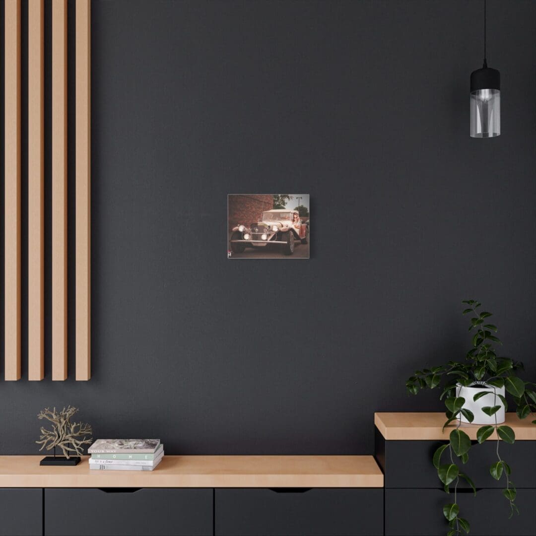 Modern living room with black walls, wooden accents, and a nature-themed painting.