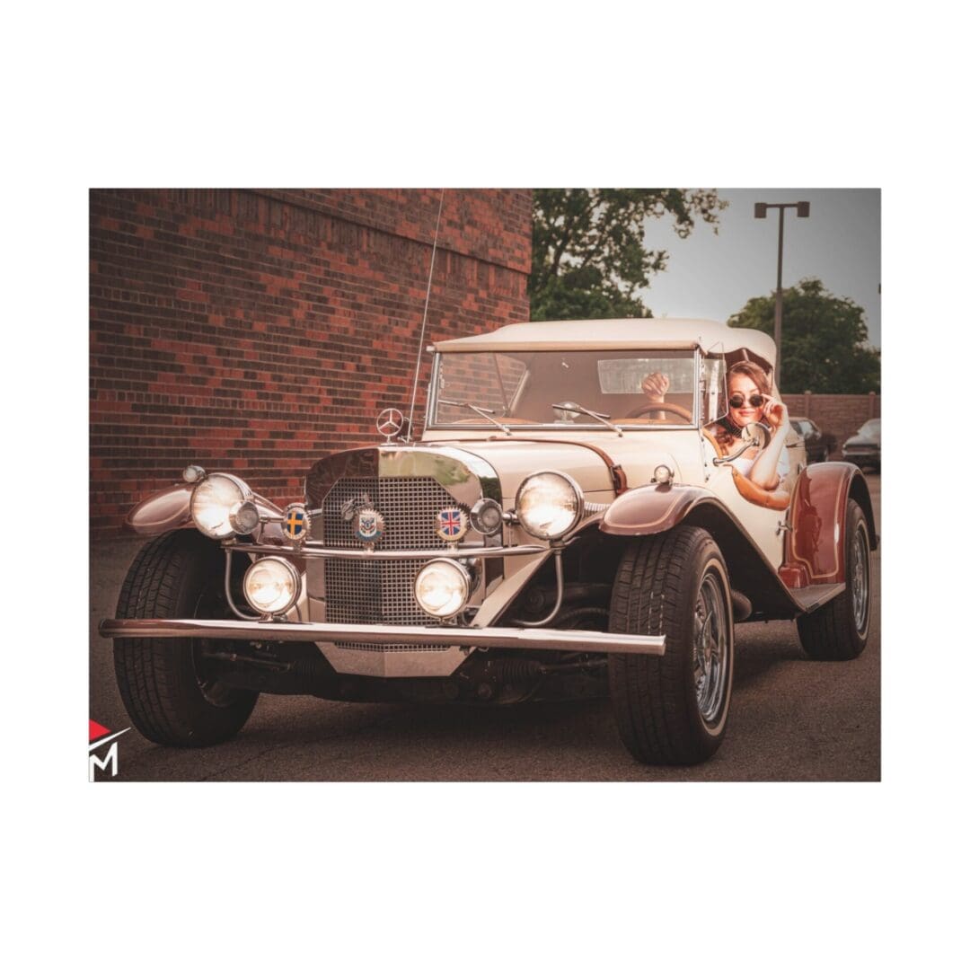 Vintage convertible car cruising on a street with passengers.