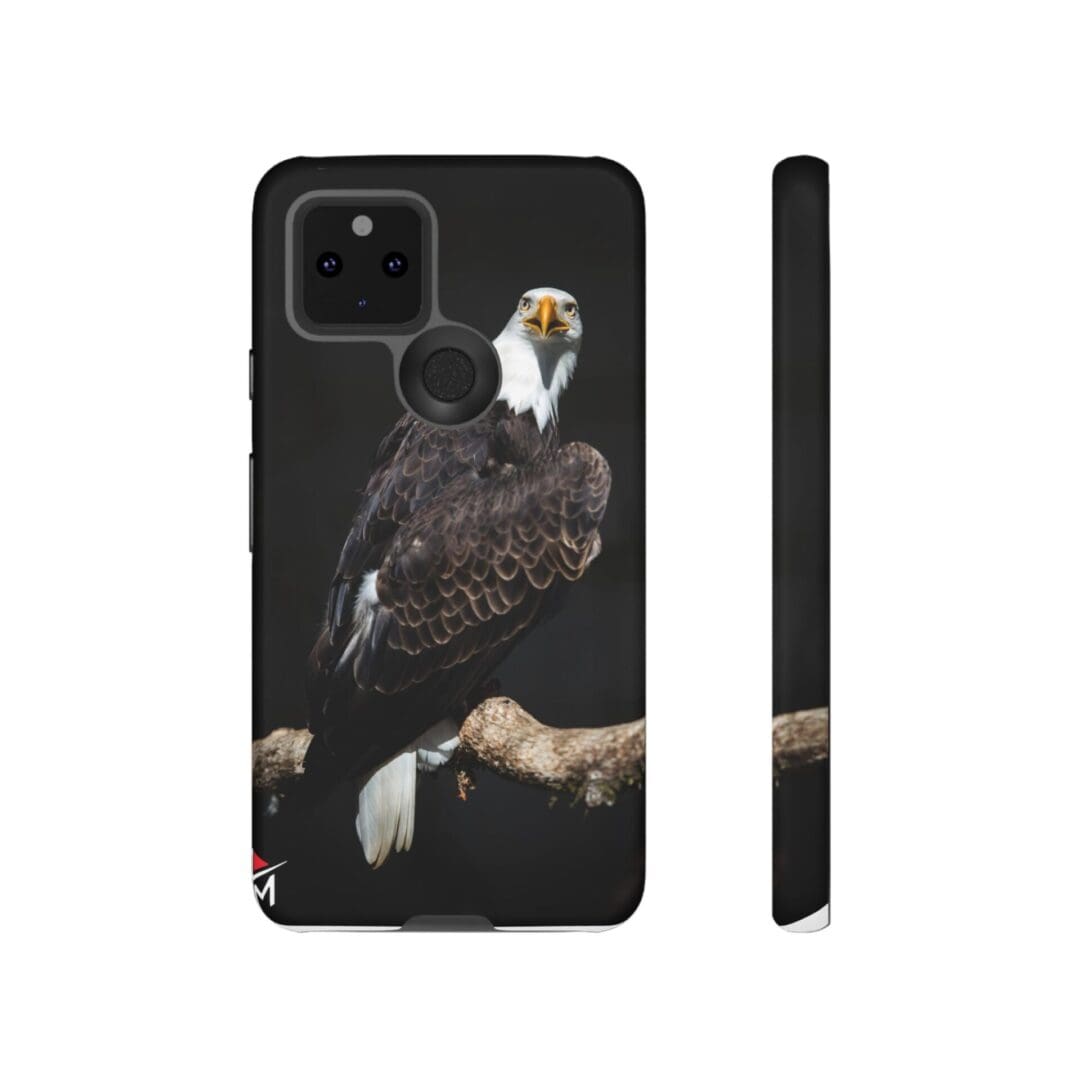 Phone case featuring a detailed eagle perched on a branch against a black background.