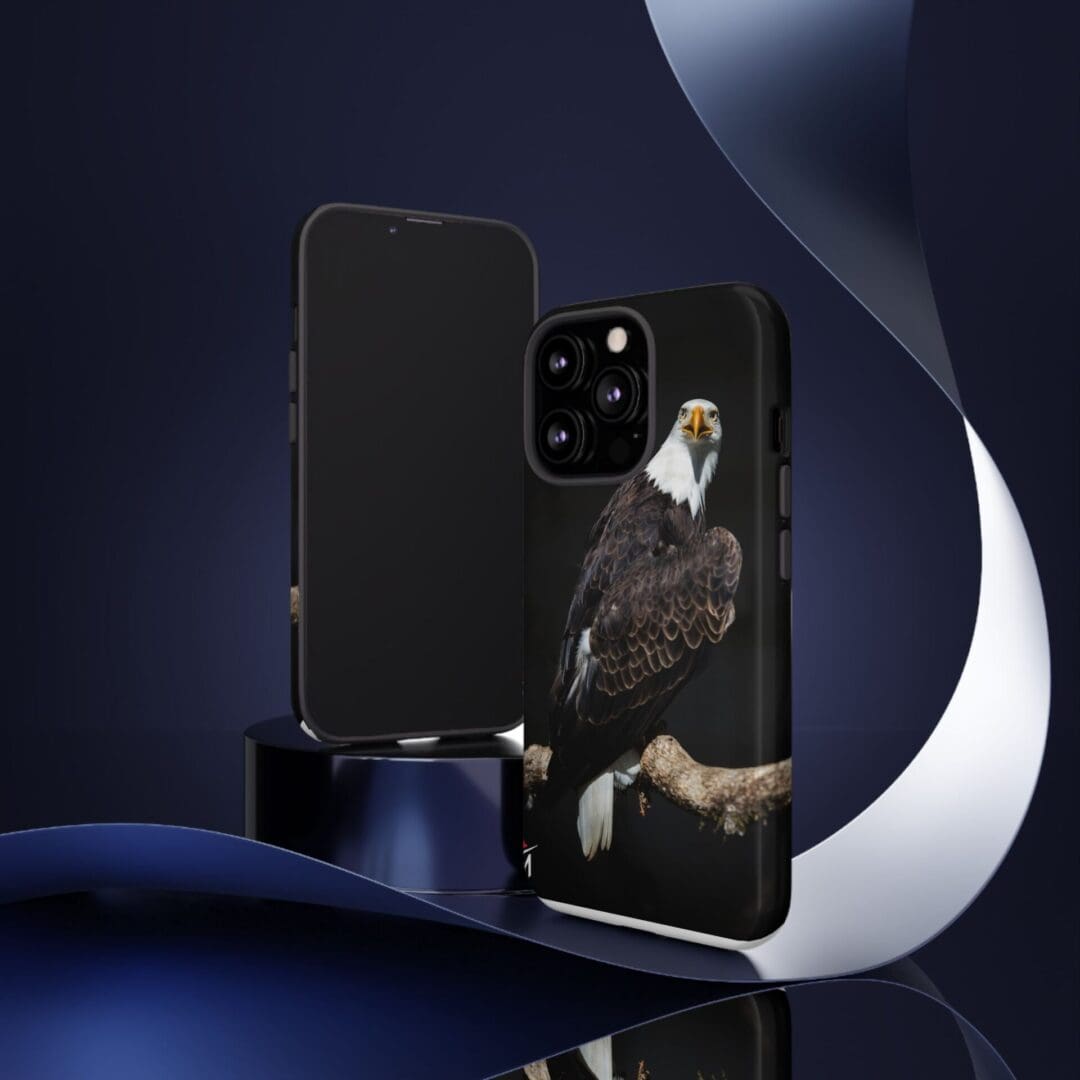 Sleek black phone case with a detailed owl design on the back.