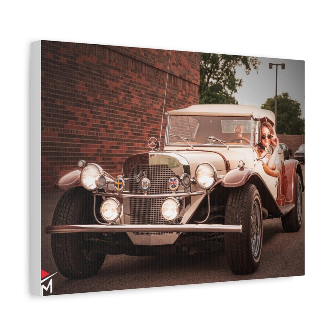 Vintage car parked outdoors with a person standing beside it.