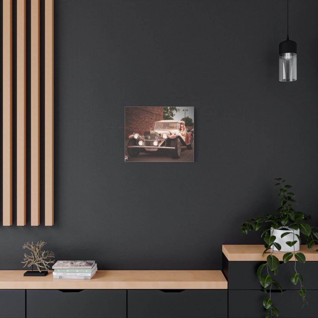 Modern workspace with black wall, wooden desk, and artistic wall decor.