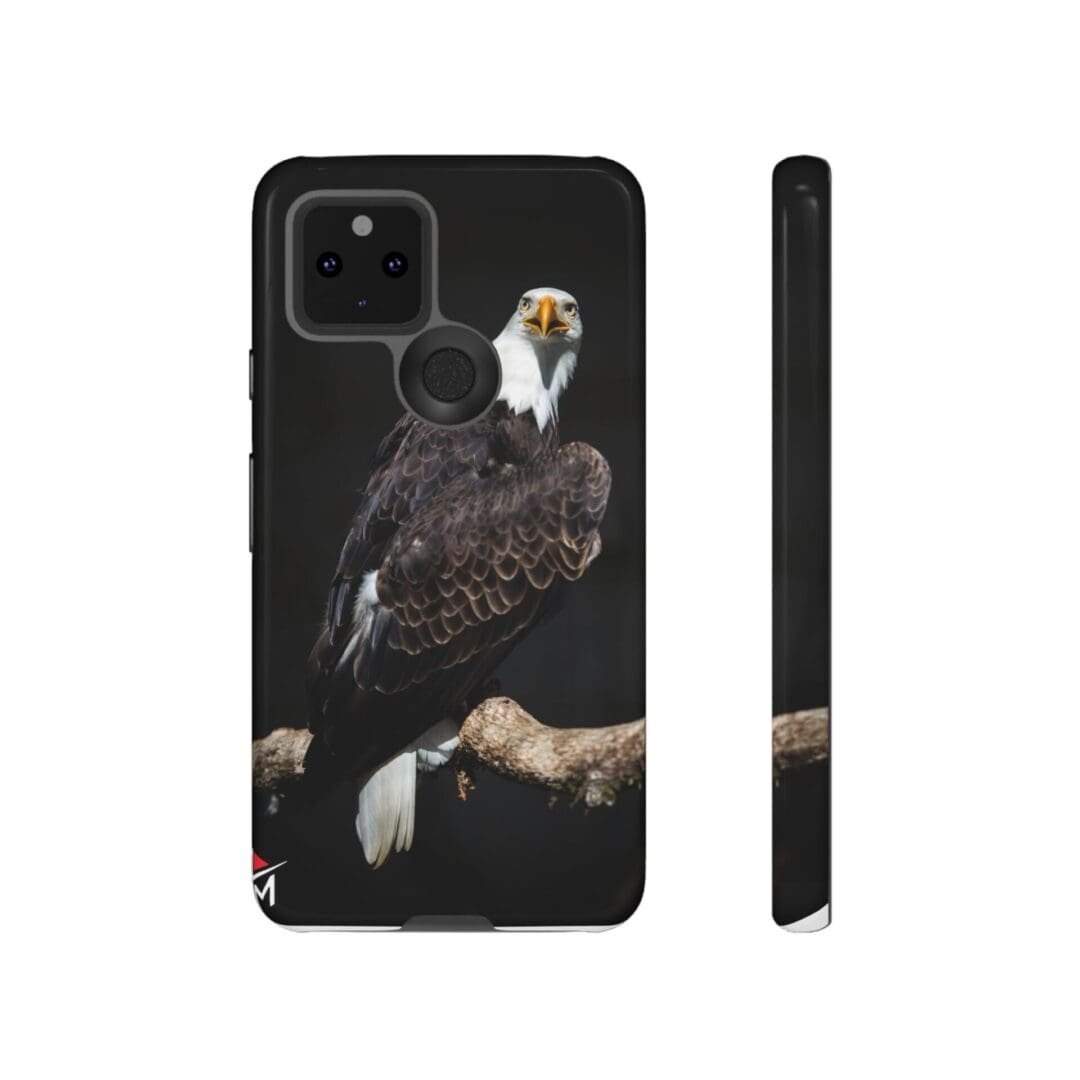 Phone case featuring a detailed eagle perched on a branch against a black background.