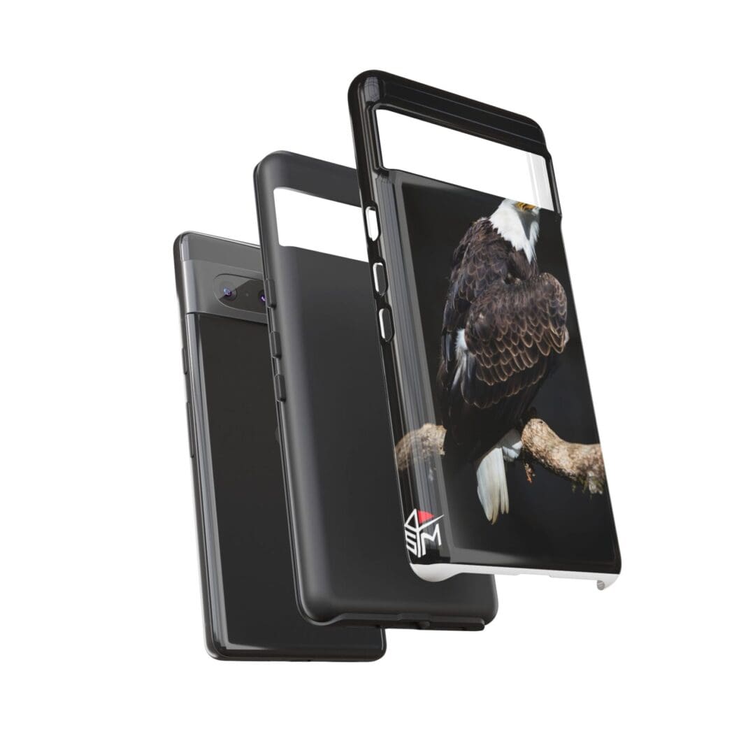 Three rugged smartphones with protective cases, shown from different angles.