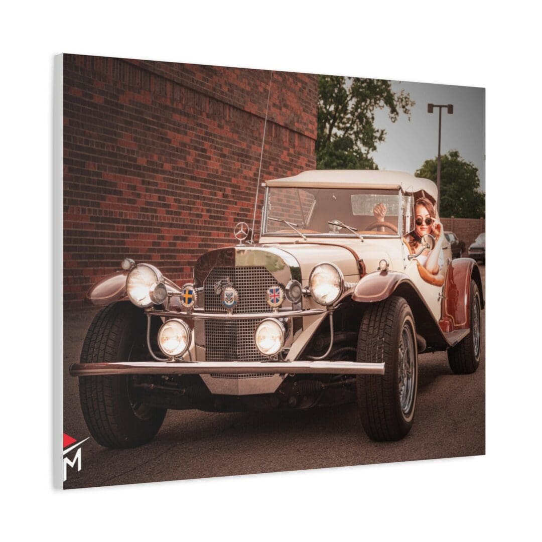 Vintage car parked on a street with a woman standing beside it.