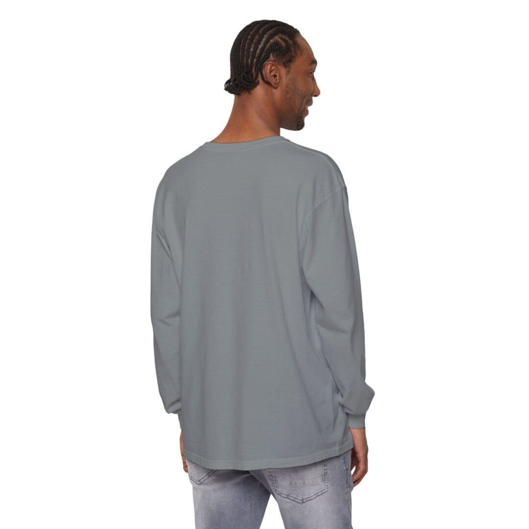 Man wearing a plain gray long-sleeve shirt, viewed from the back.