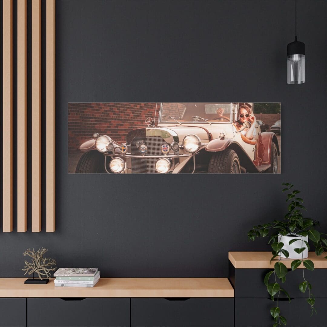 Modern living room with vintage car wall art and minimalist decor.