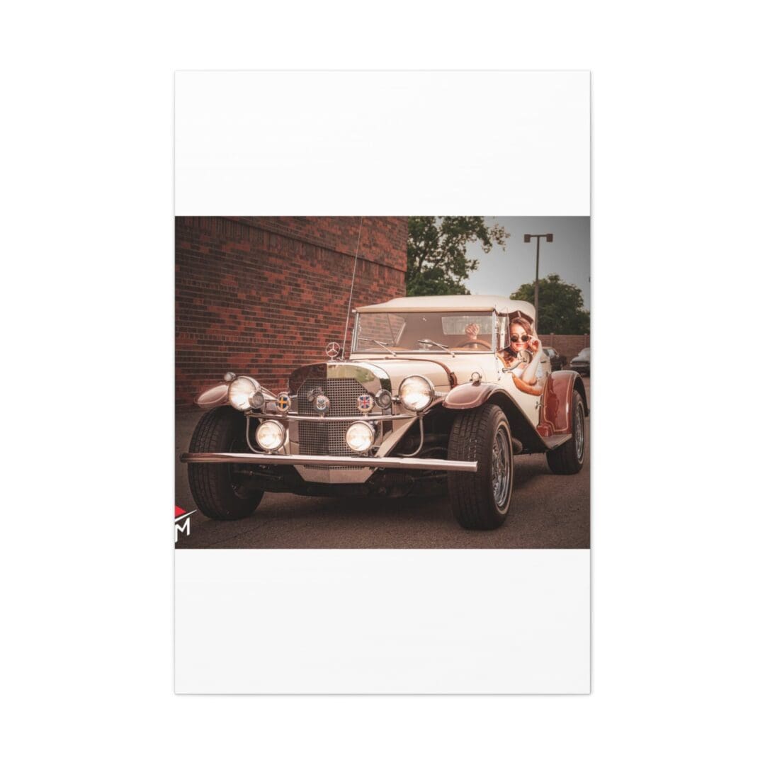 Vintage car parked near a brick wall with greenery in the background.