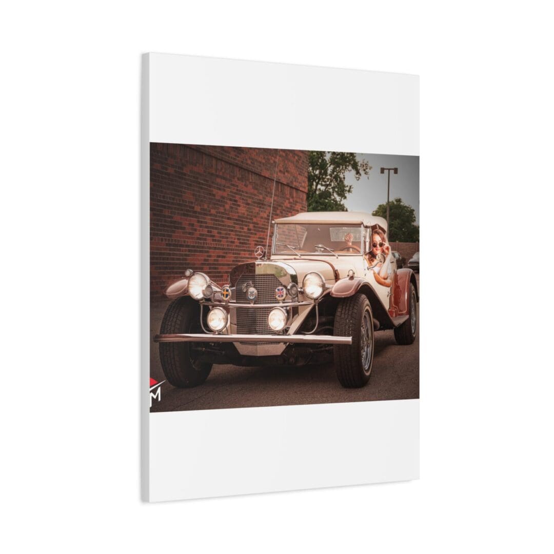 Vintage car parked outdoors near a brick wall.