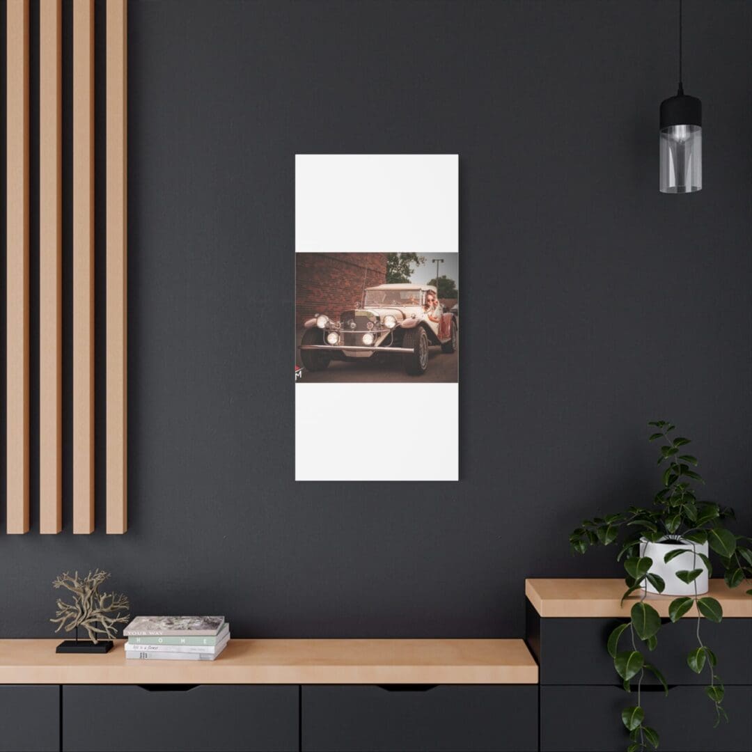 Modern workspace with minimalist decor and landscape photo on wall.