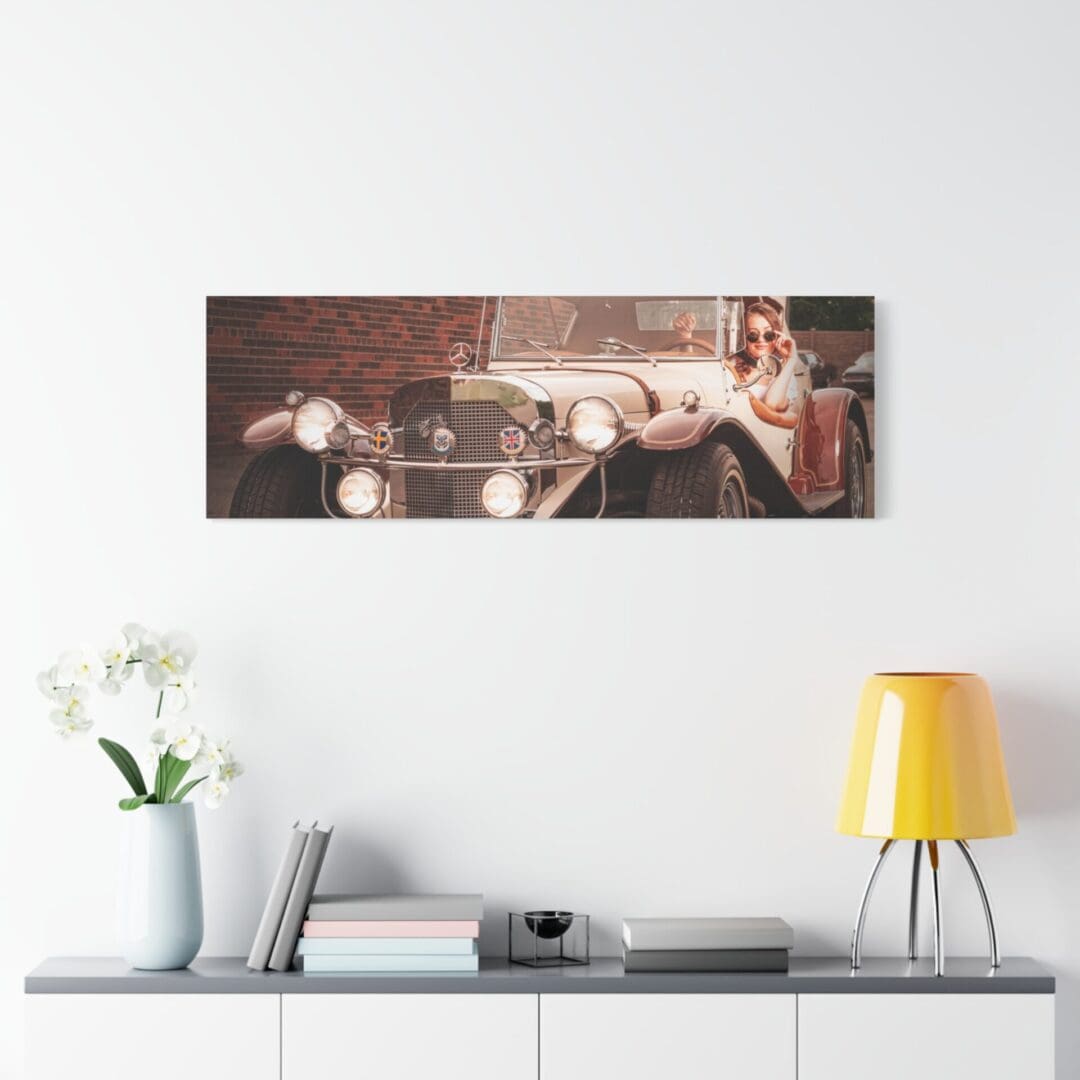 Cozy living room with a panoramic wall art of a relaxed woman and cat.
