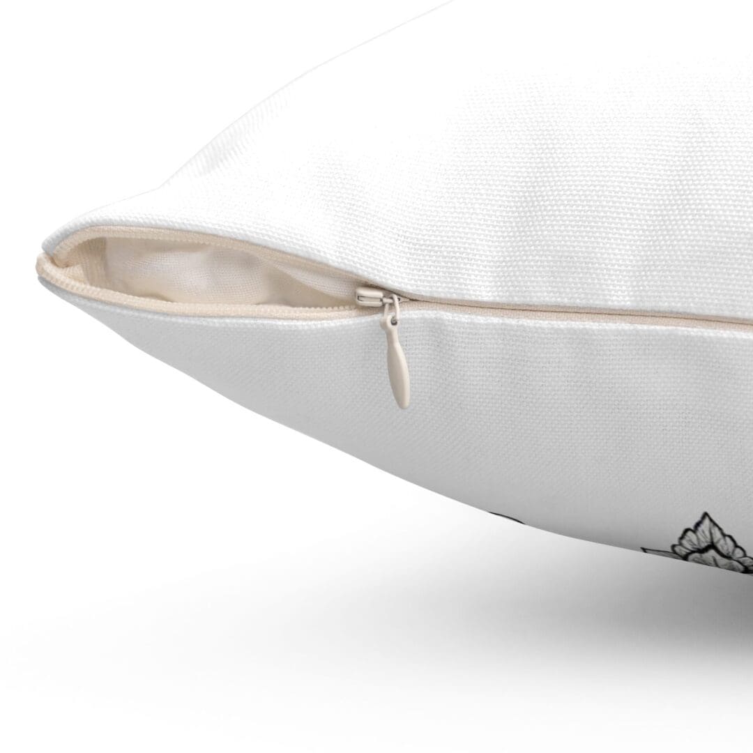 Close-up of a white fabric bag with a zipper.
