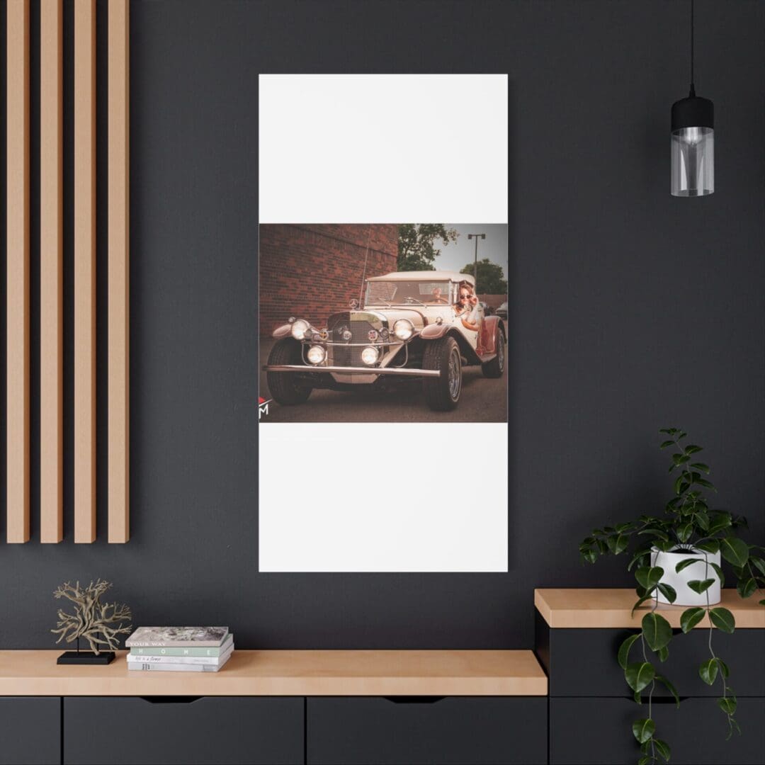 Modern black wall with stylish decor and a framed photo of a vintage car.