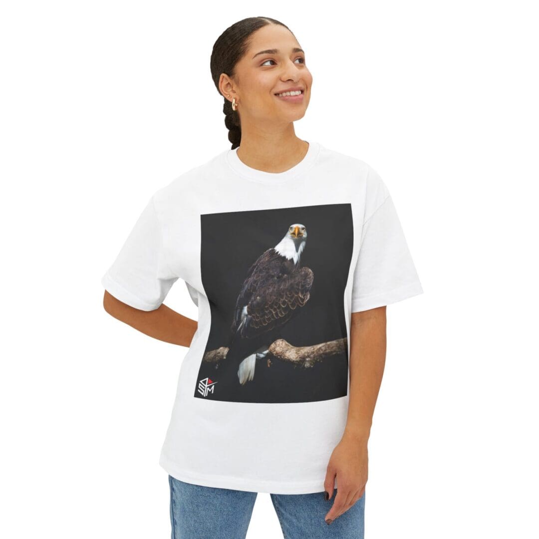 Woman wearing a white T-shirt with a bald eagle print.