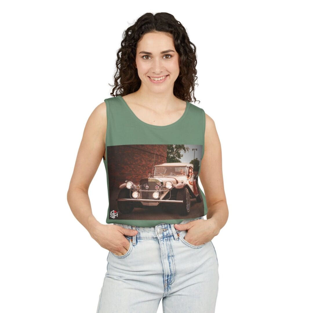 Woman wearing a sleeveless top with a vintage car photo printed on it.