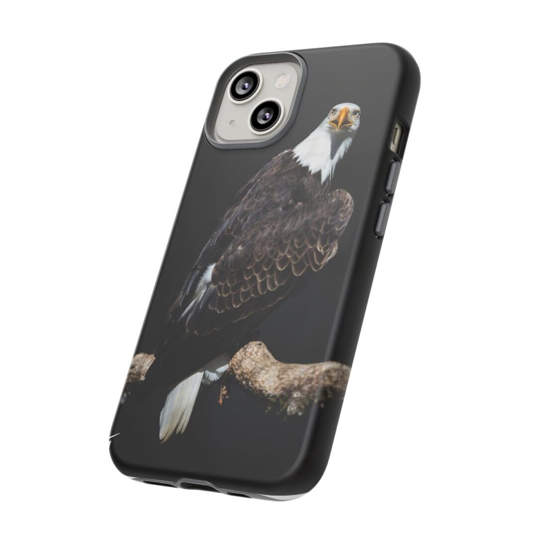 Black phone case with an artistic design of a bird and floral elements.