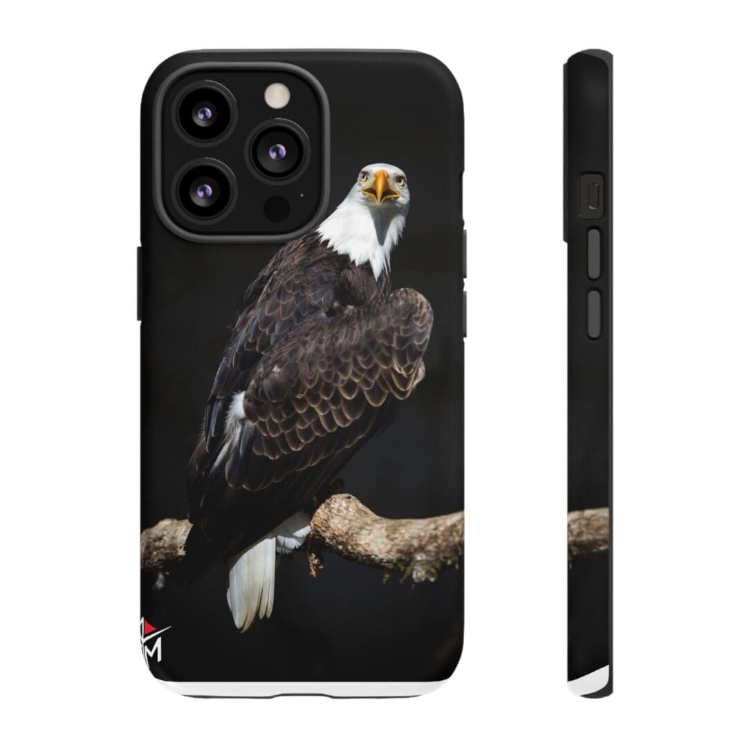 Black phone case featuring a realistic bald eagle perched on a branch.